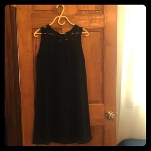 Black dress with lace neckline
